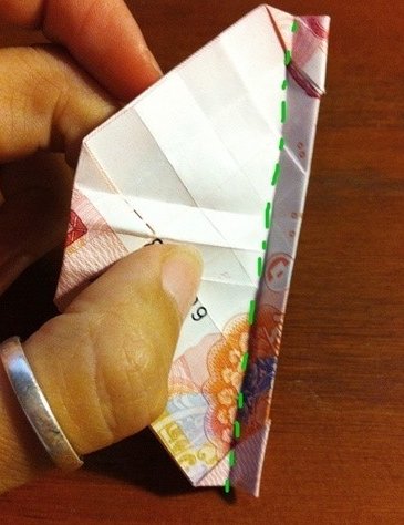 用一百元折玫瑰花怎么折，求图解